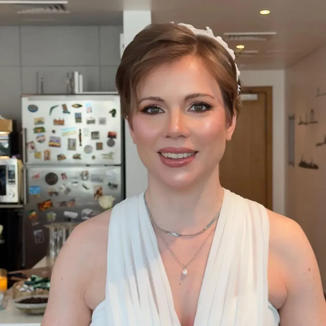 The same client after bridal makeup & hair by Studio Name