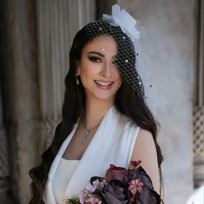 The same client after bridal makeup & hair by Studio Name