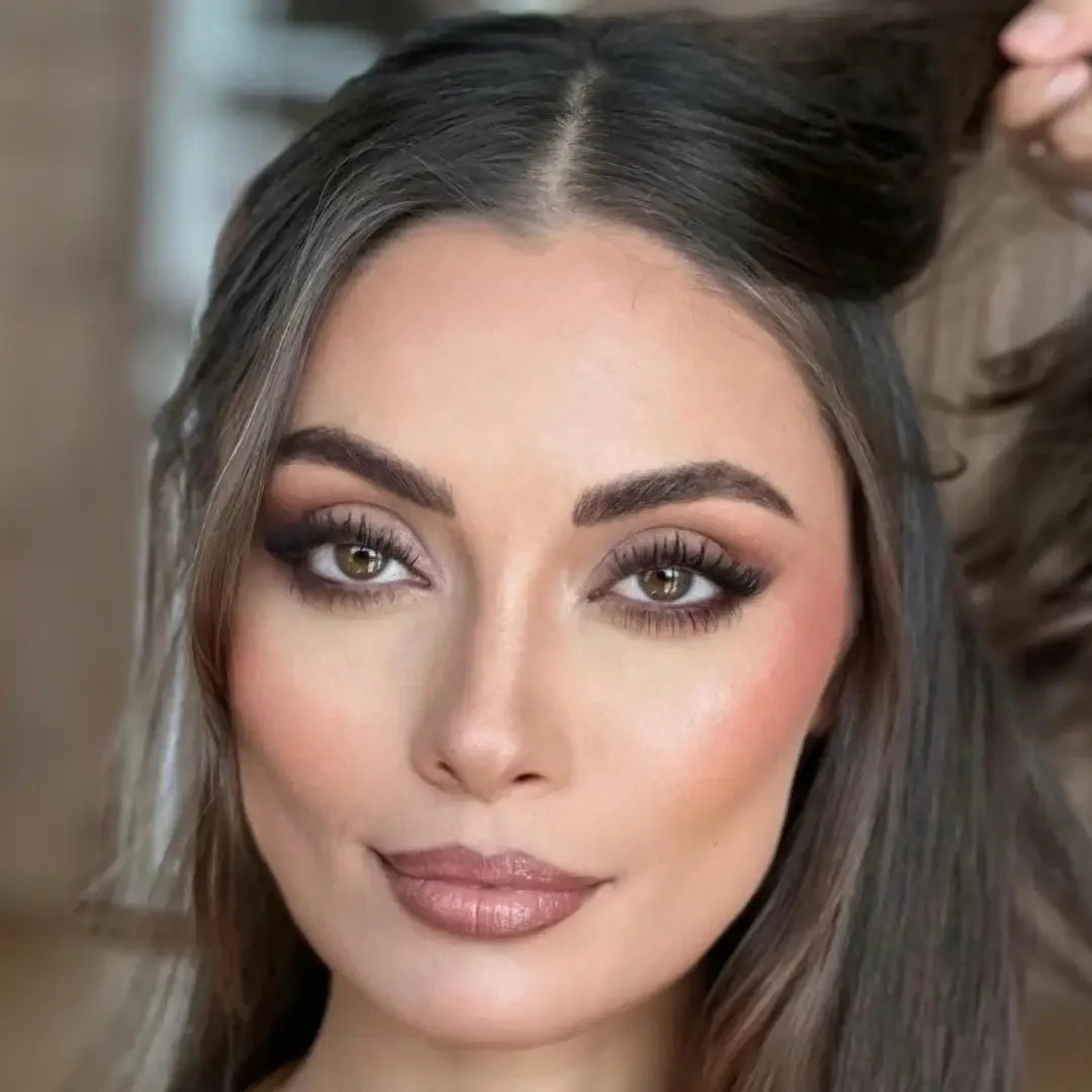The same client after photoshoot makeup by Studio Name