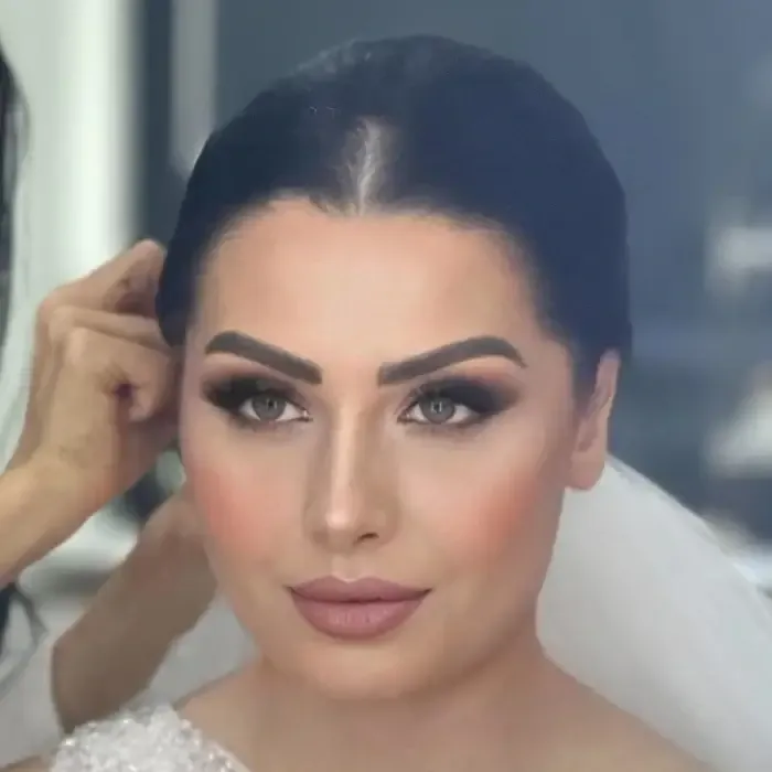 The same client after bridal makeup & hair by Studio Name