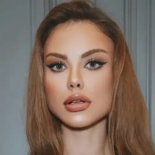 The same client after photoshoot makeup by Studio Name