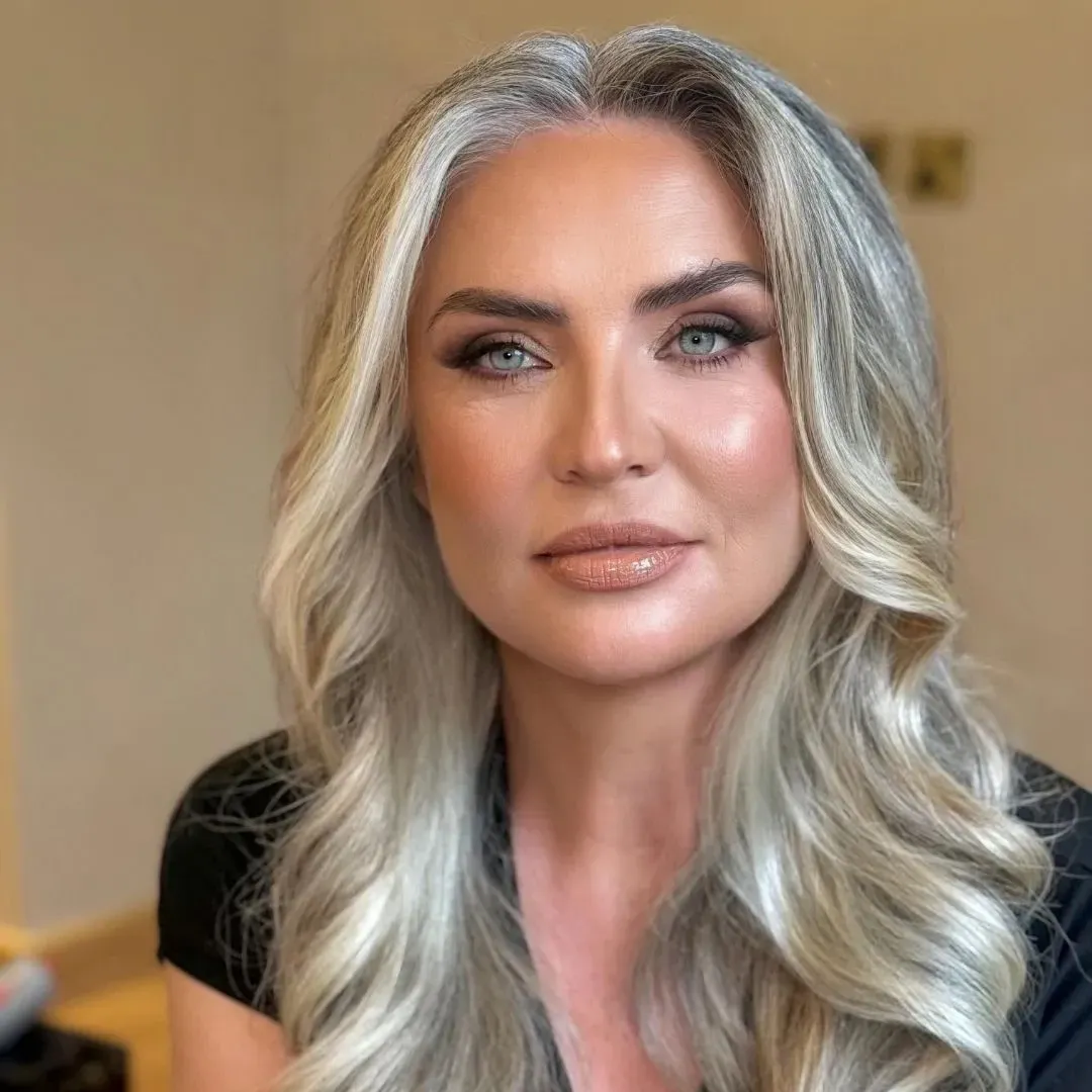 The same client after makeup & hair at home by Studio Name