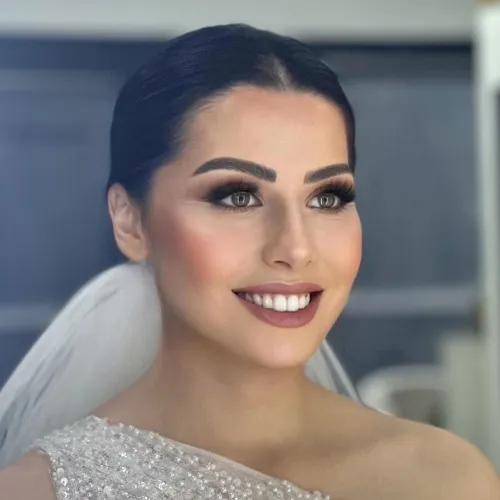 The same client after bridal makeup & hair by Studio Name