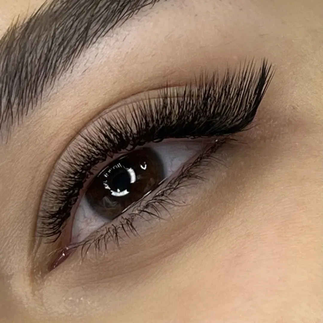 The same client after eyelash extensions by Studio Name