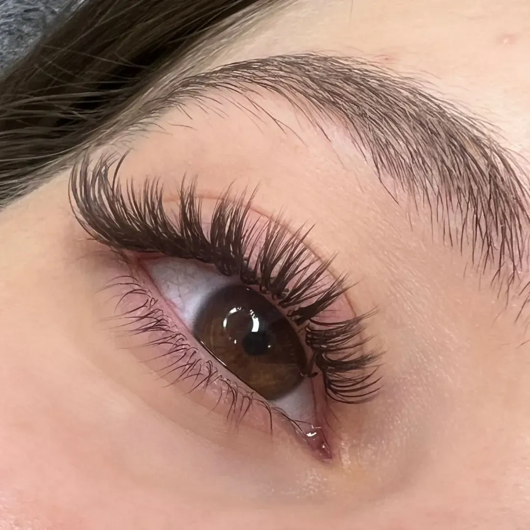 The same client after eyelash extensions by Studio Name