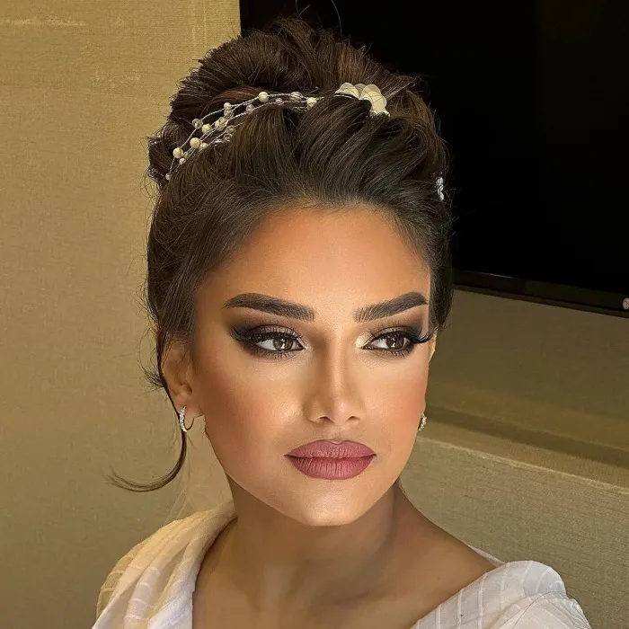 The same client after wedding day glam by Studio Name