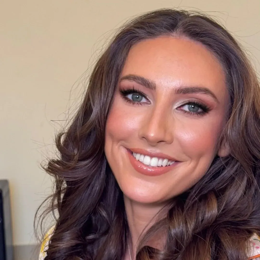 The same client after makeup & hair at home by Studio Name