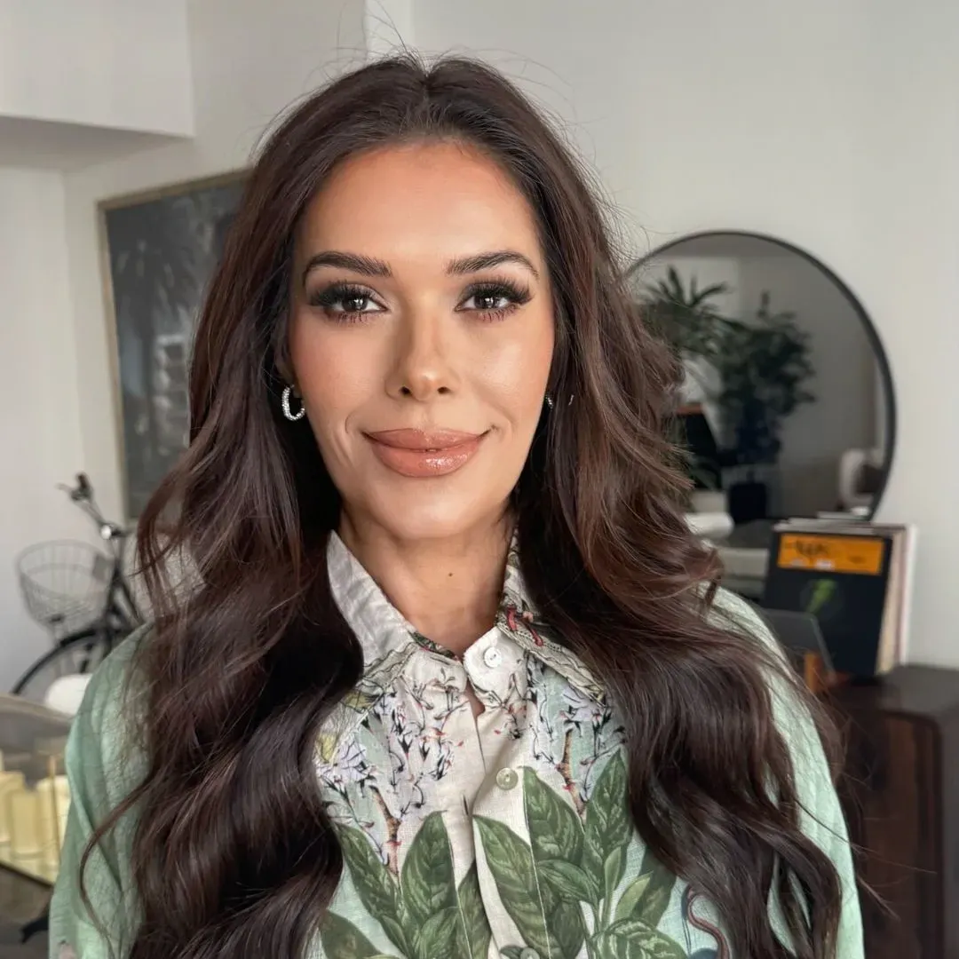 The same client after makeup & hair at home by Studio Name